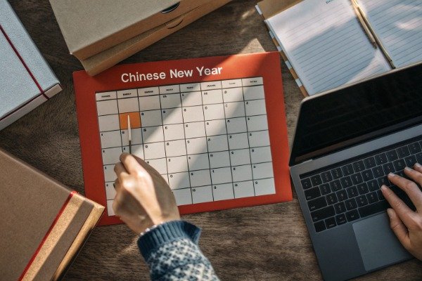 Overhead desk with calendar and planning documents (ID#5)
