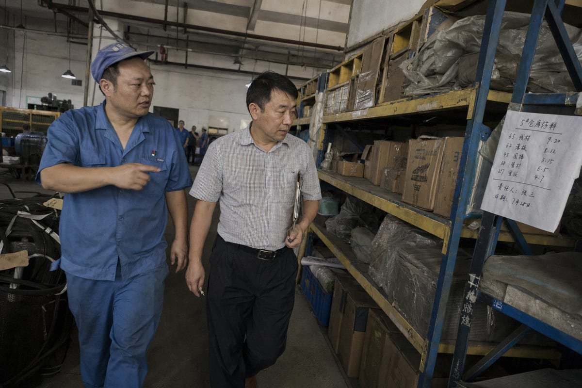 Factory audit process verifying safety compliance through onsite inspection (ID#3)