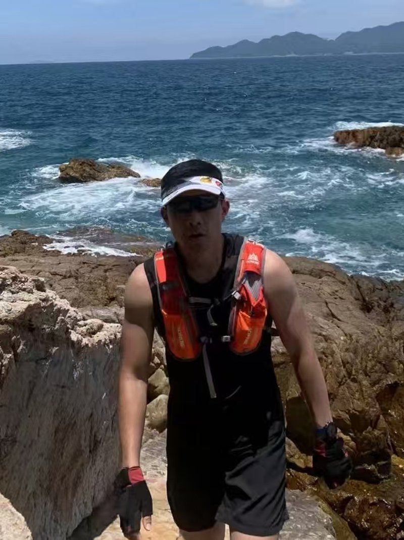 Allen trail running by the coast — part of the GoSource story.