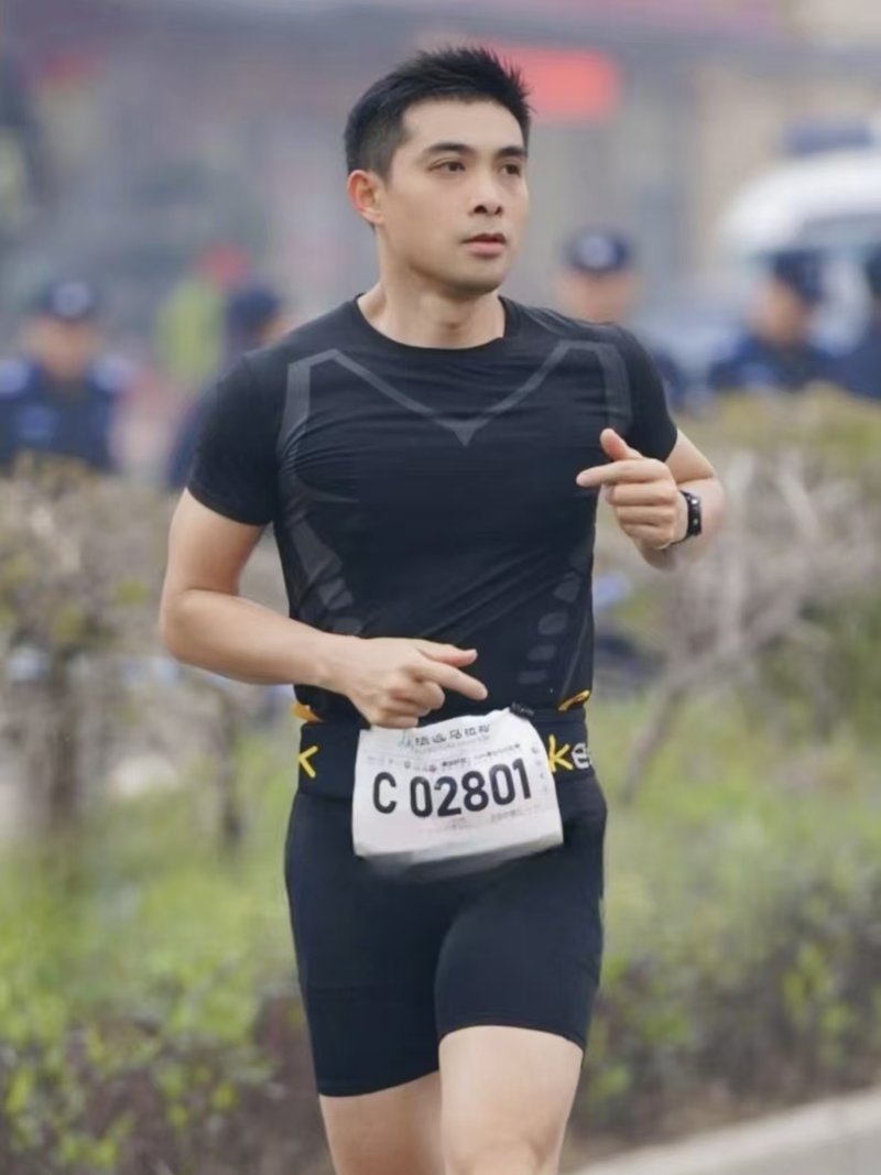 Allen running a road race — discipline built over 12 years.