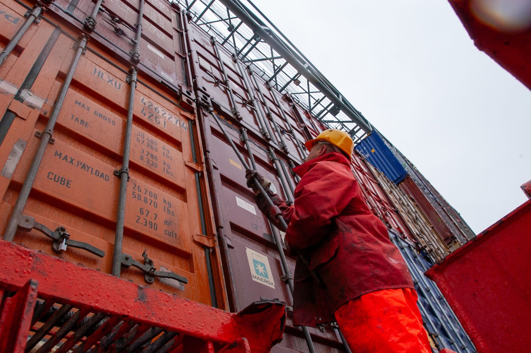 A held container at a US port starts two clocks at once: CBP's 30-day rebuttal window and the terminal's demurrage meter.